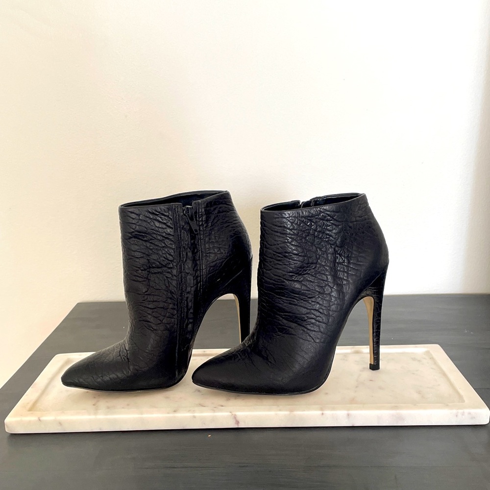 Aldo 4 inch heel leather black ankle bootie. Size 7 excellent condition.